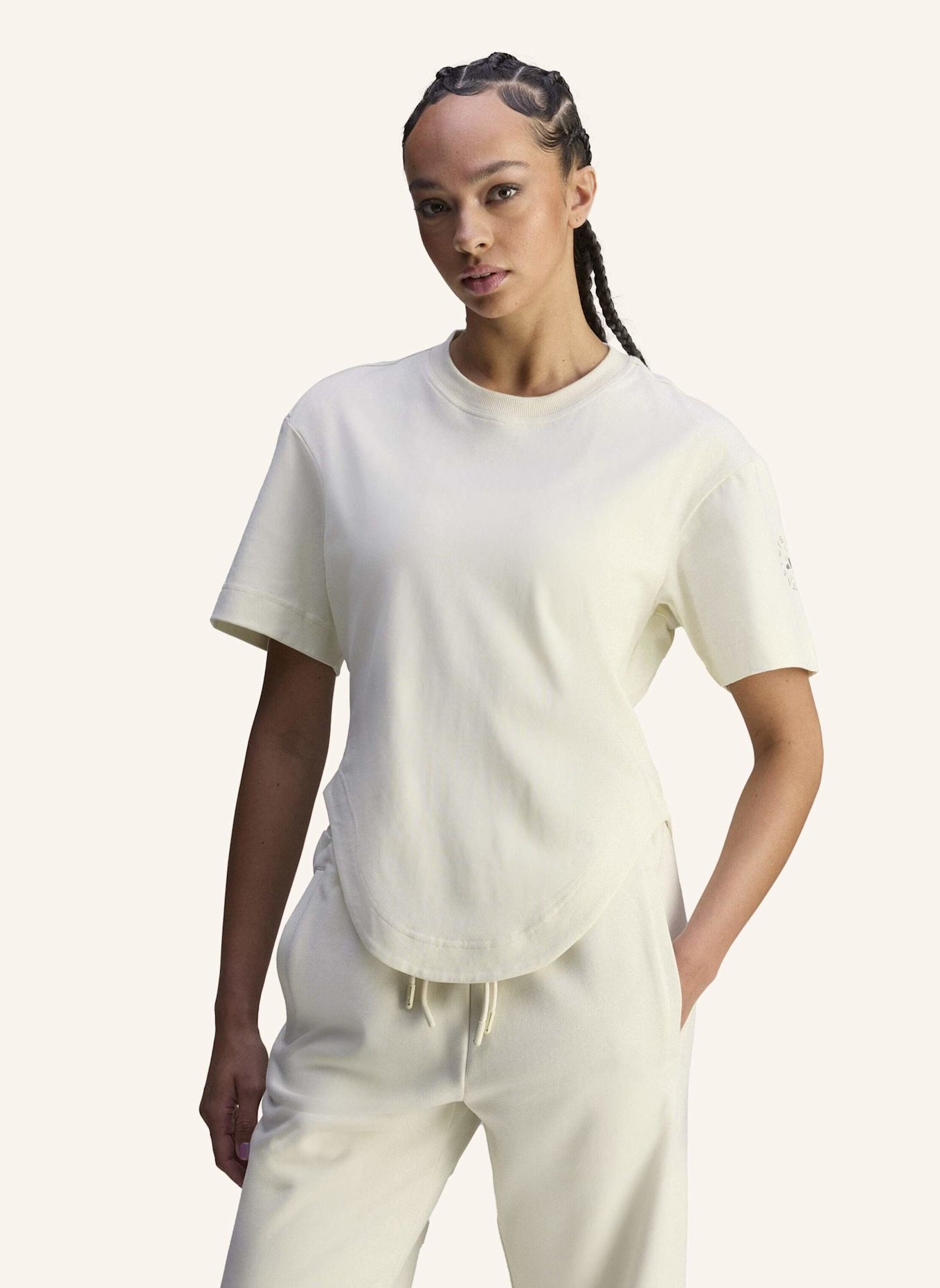 adidas by Stella McCartney ADIDAS BY STELLA MCCARTNEY SPORTSWEAR CURVED HEM T-SHIRT: CREME