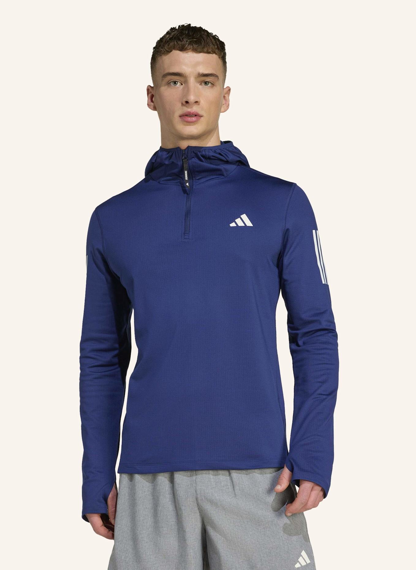 adidas OWN THE RUN WINTERIZED HOODIE MIT HALBEM REISSVERSCHLUSS: BLAU