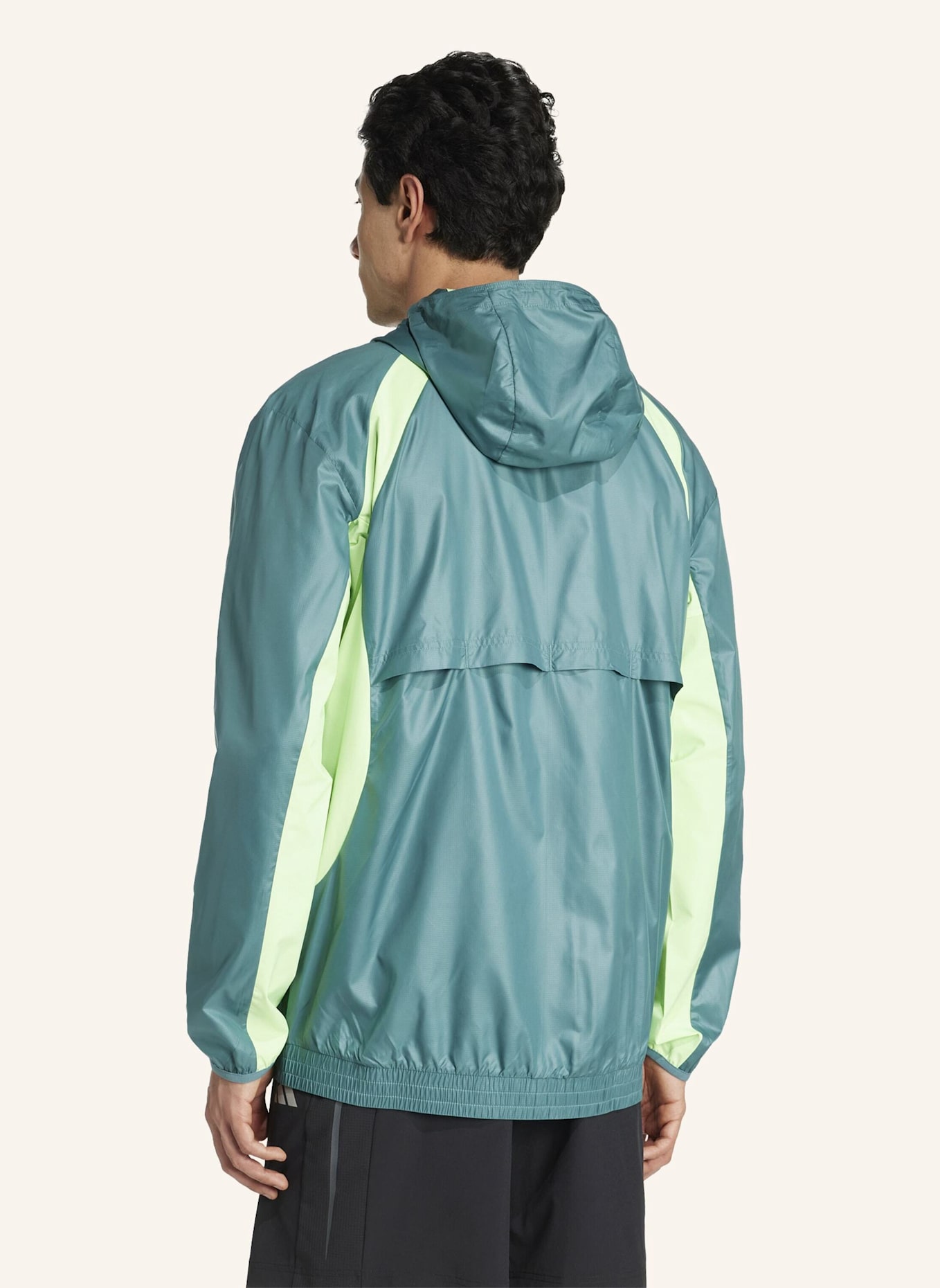 adidas TECH APPAREL WINDBREAKER: TÜRKIS/ NEONGRÜN