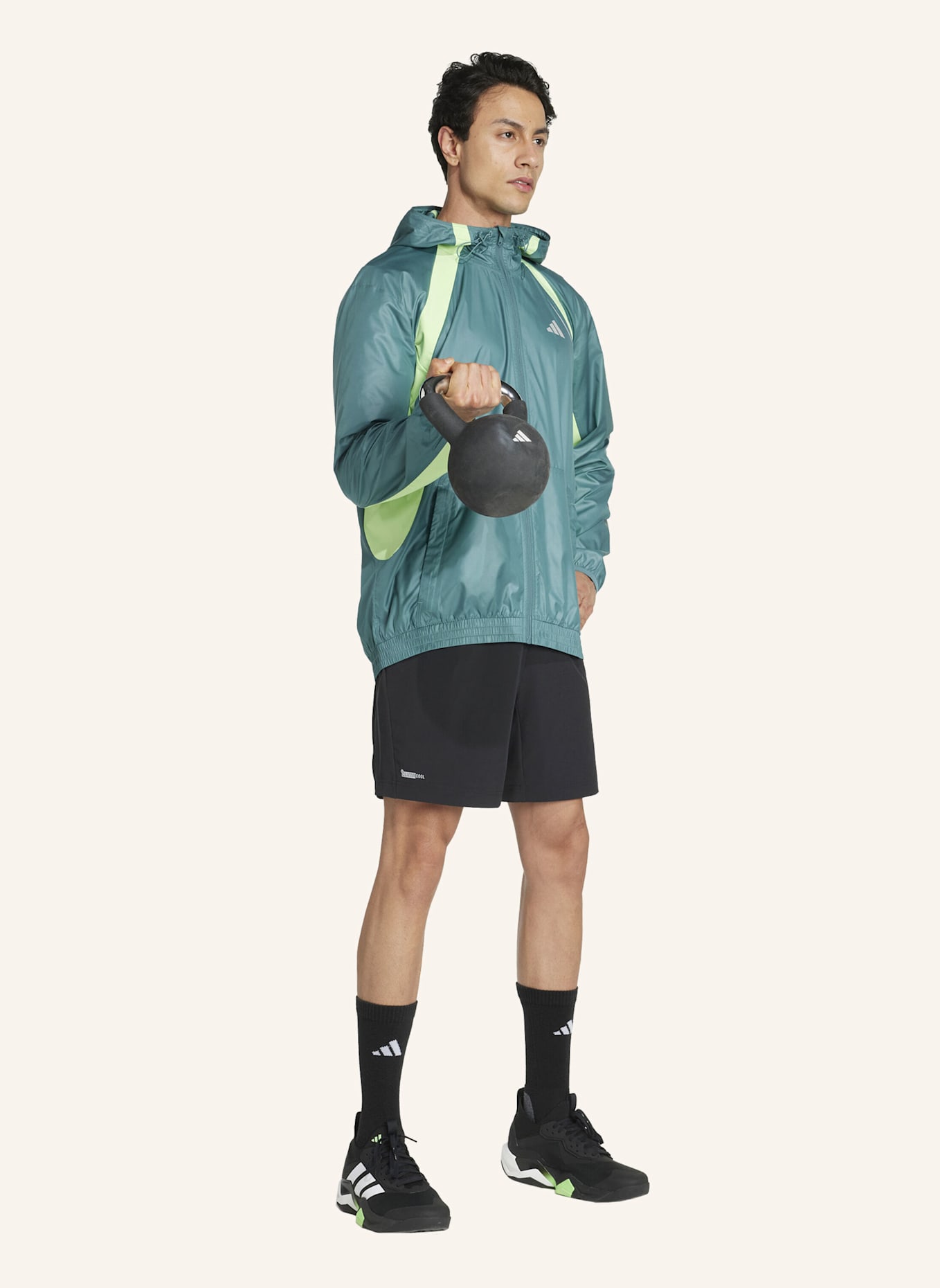 adidas TECH APPAREL WINDBREAKER: TÜRKIS/ NEONGRÜN