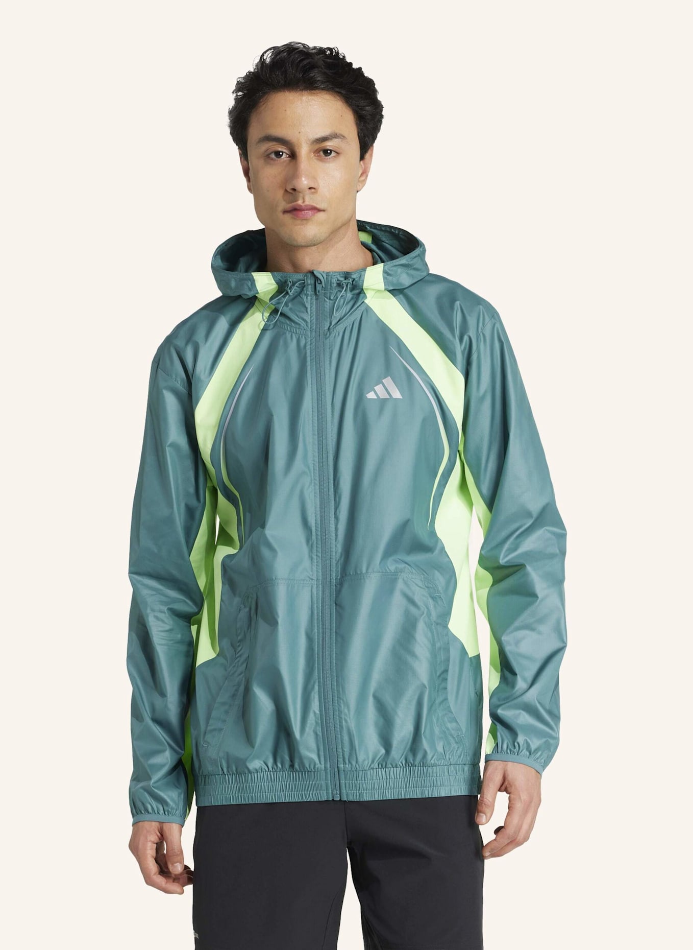 adidas TECH APPAREL WINDBREAKER: TÜRKIS/ NEONGRÜN