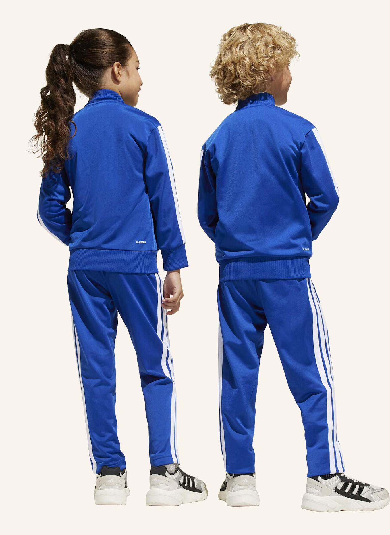 adidas SEASONAL ESSENTIALS TIBERIO 3-STREIFEN TRICOT KIDS TRAININGSANZUG: BLAU/ WEISS