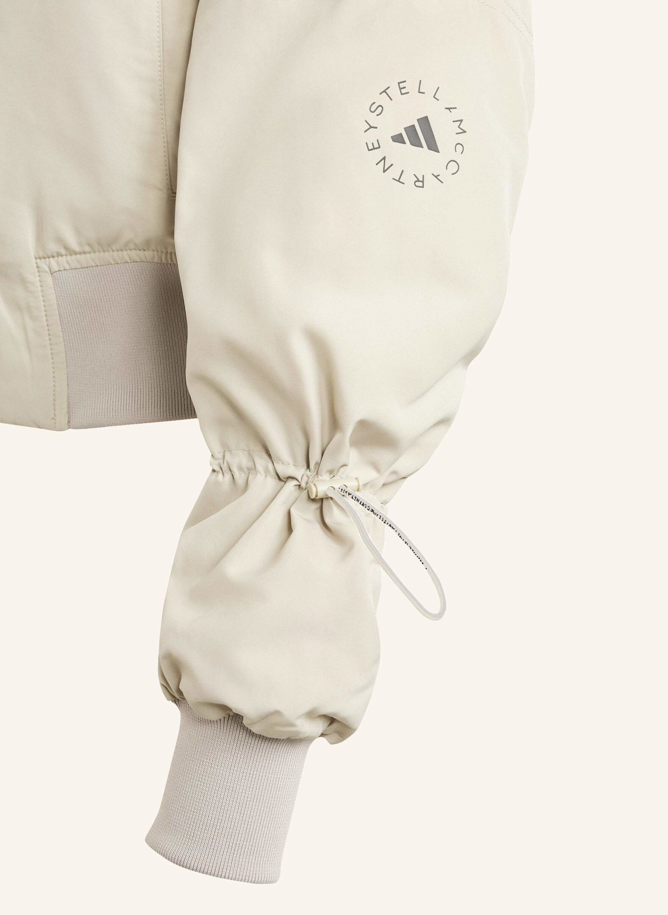 adidas by Stella McCartney ADIDAS BY STELLA MCCARTNEY TRUENATURE WOVEN CROPPED BOMBERJACKE: BEIGE