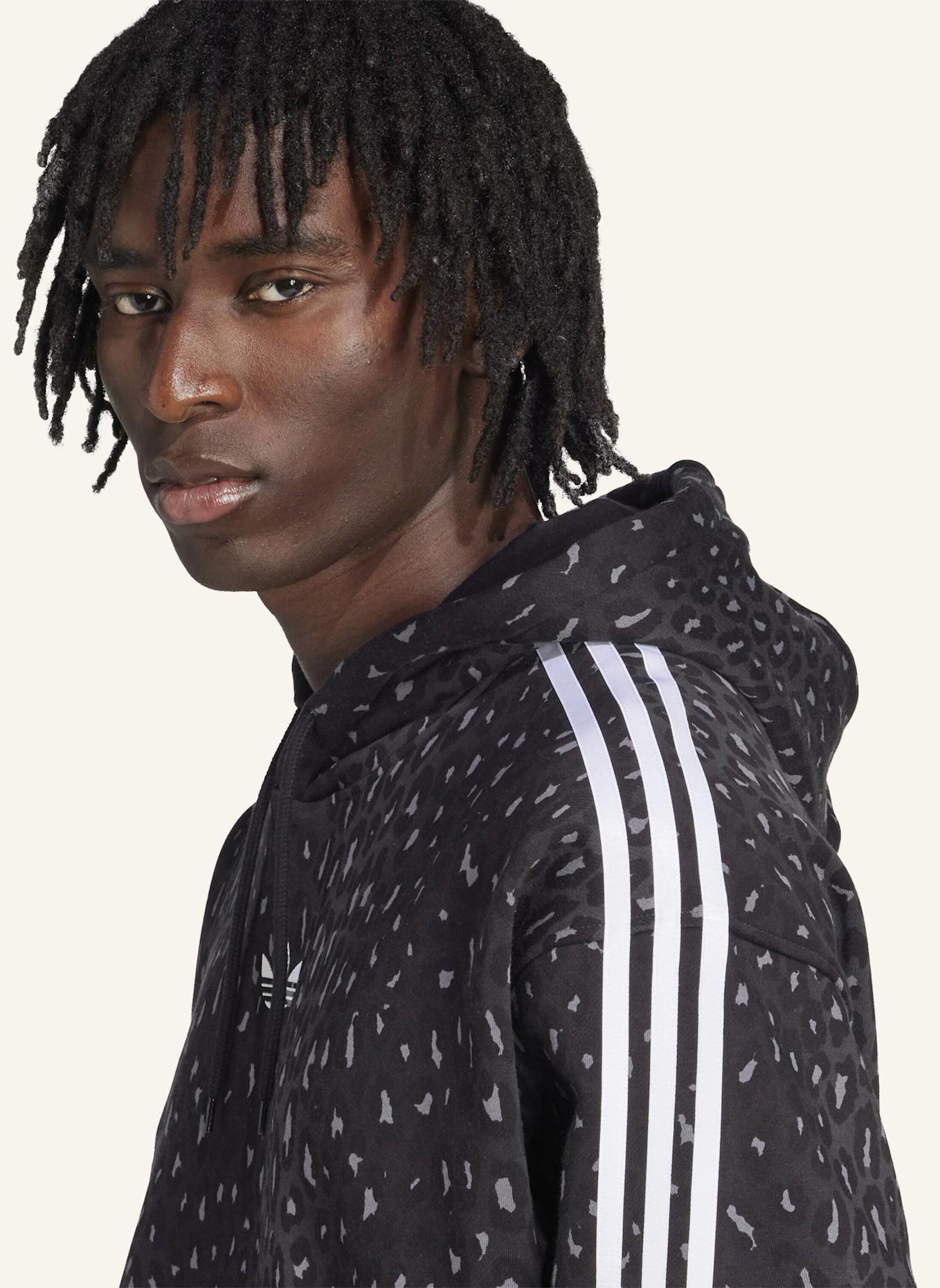 adidas Originals LEO ALL OVER PRINT LOOSE HOODIE: SCHWARZ