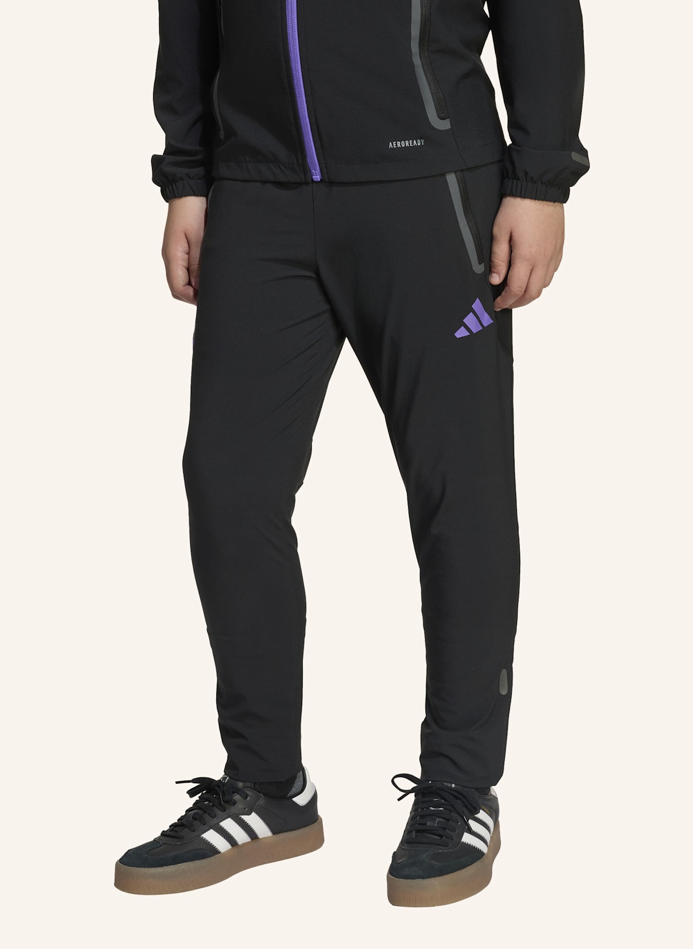 adidas MANCHESTER UNITED TIRO 25 COMPETITION VIS TECH KIDS TRAVEL HOSE: SCHWARZ