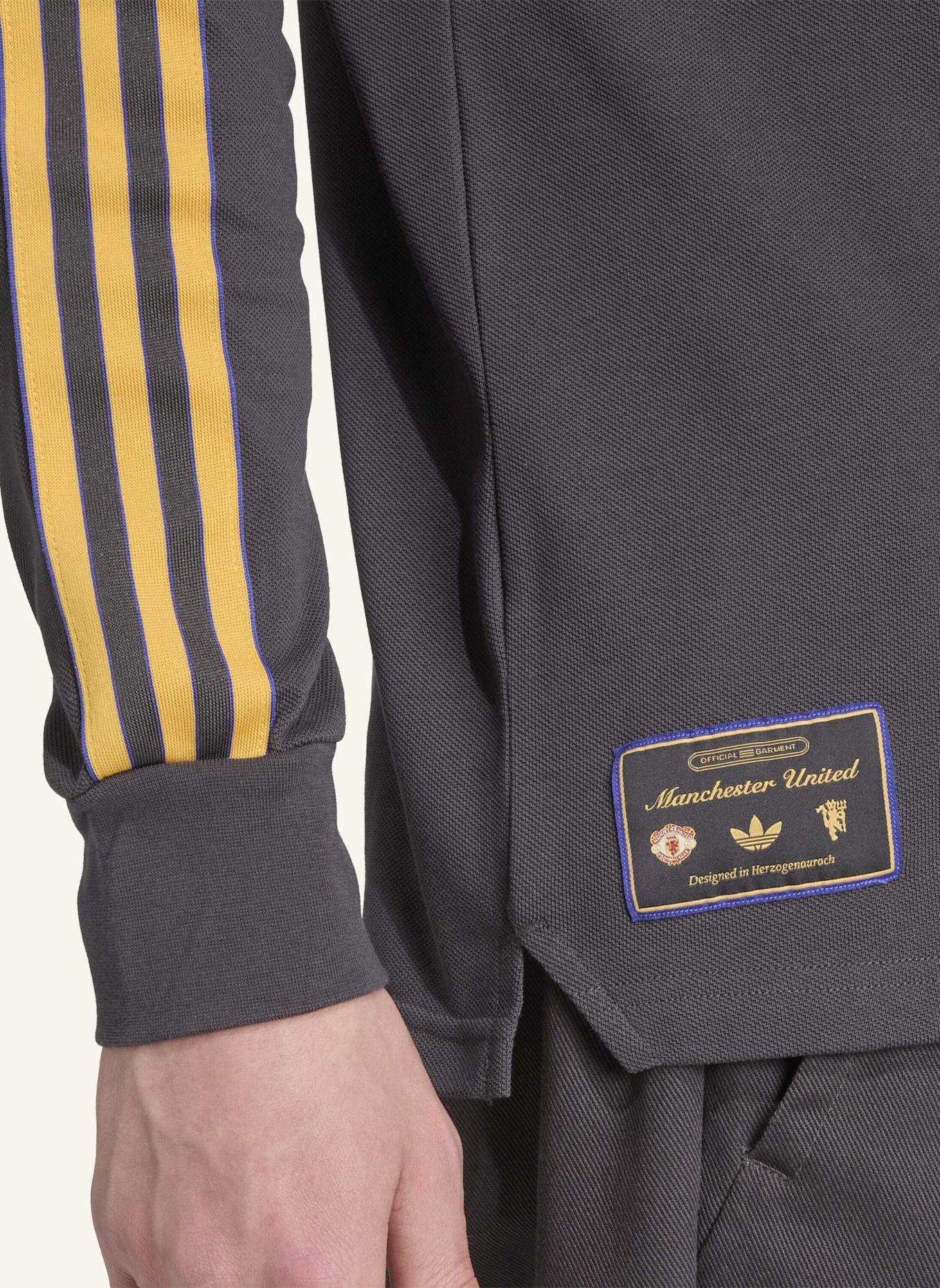 adidas Originals MANCHESTER UNITED TERRACE ICONS LANGÄRMELIGES POLOSHIRT: SCHWARZ