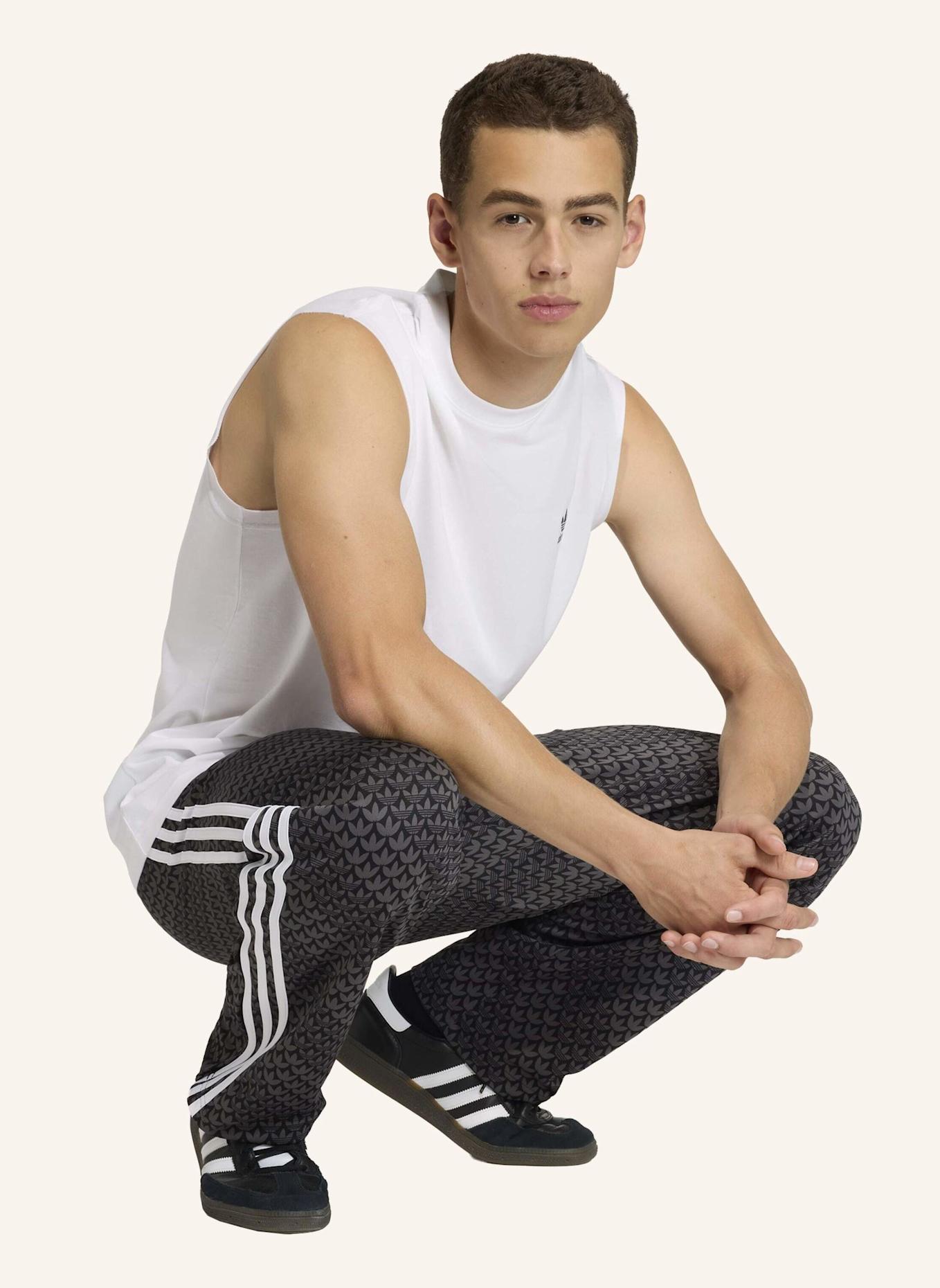 adidas Originals FIREBIRD LOOSE MONOGRAMM TRAININGSHOSE: SCHWARZ