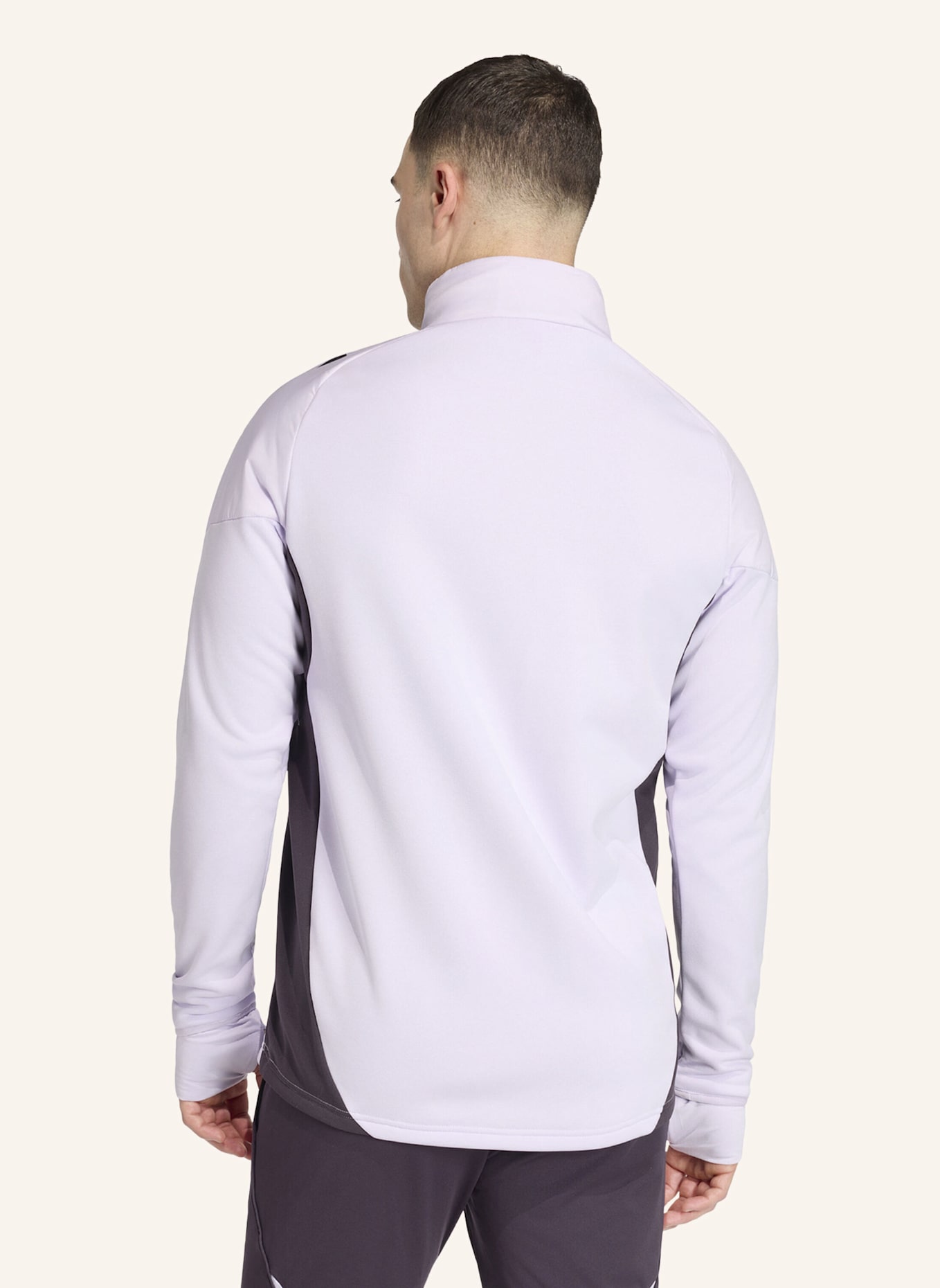 adidas MANCHESTER UNITED TIRO 25 COMPETITION WINTERIZED OBERTEIL: LILA/ SCHWARZ