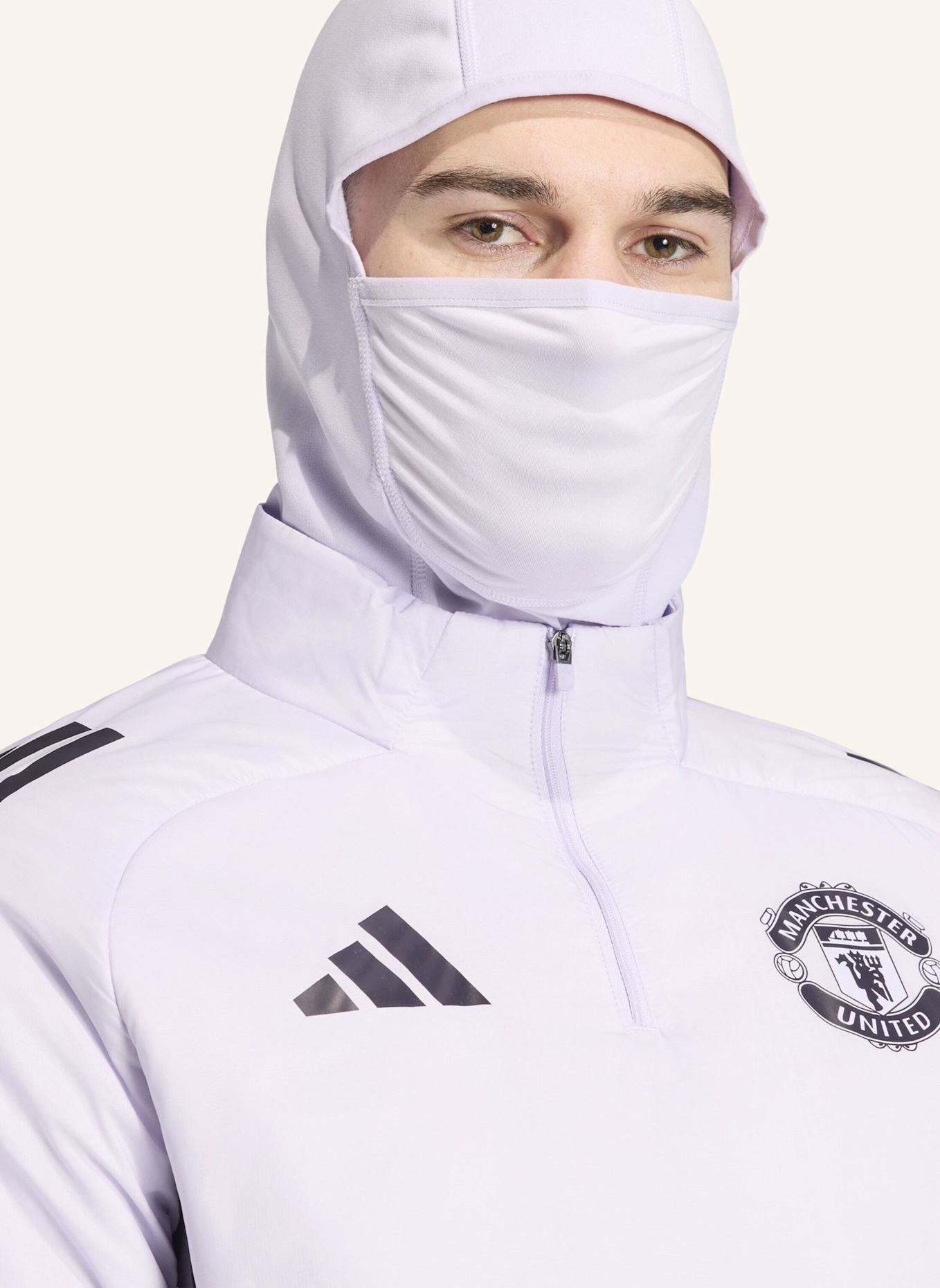 adidas MANCHESTER UNITED TIRO 25 COMPETITION WINTERIZED OBERTEIL: LILA/ SCHWARZ