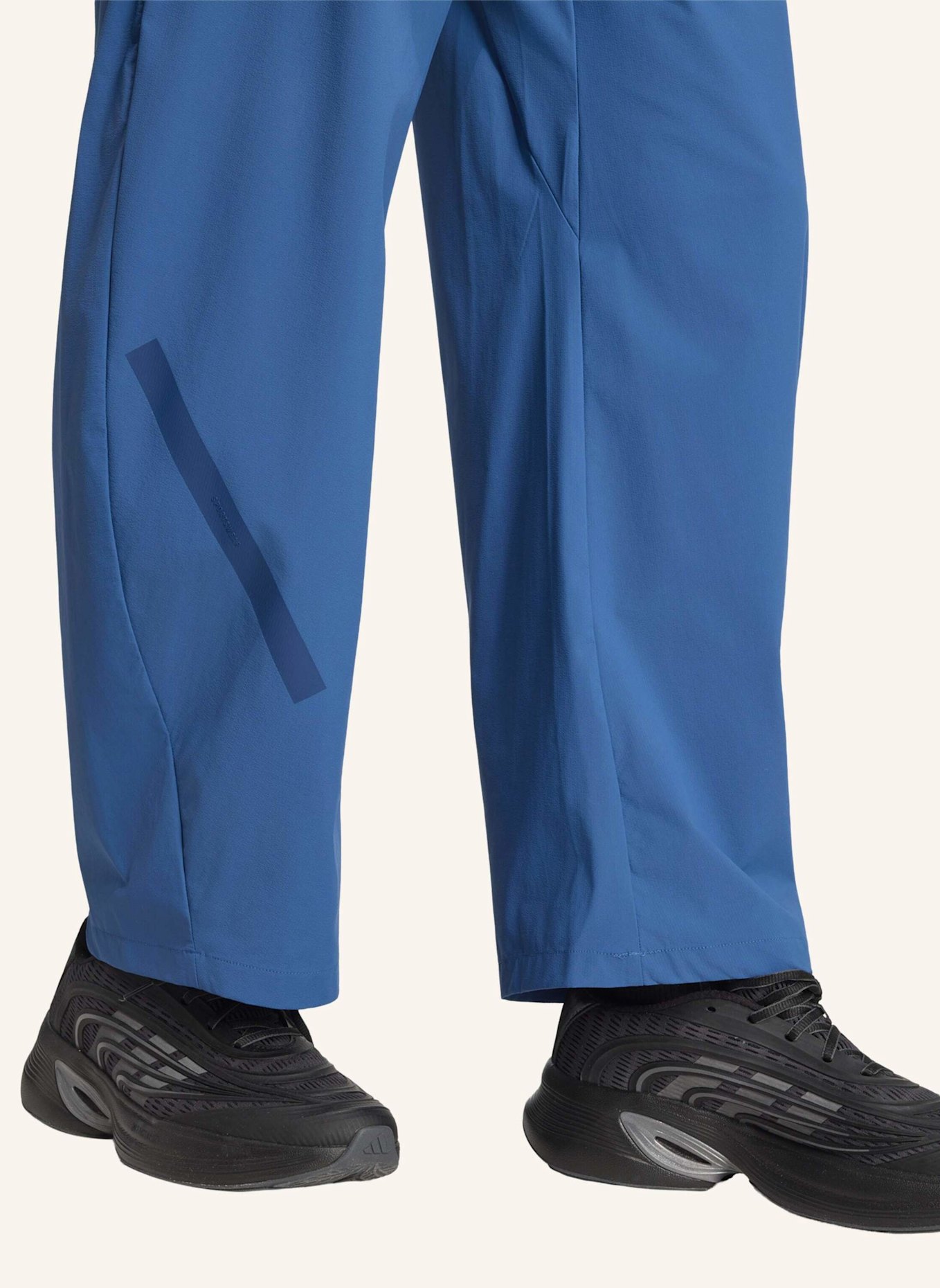 adidas ADIDAS Z.N.E. WOVEN PANT: BLAU