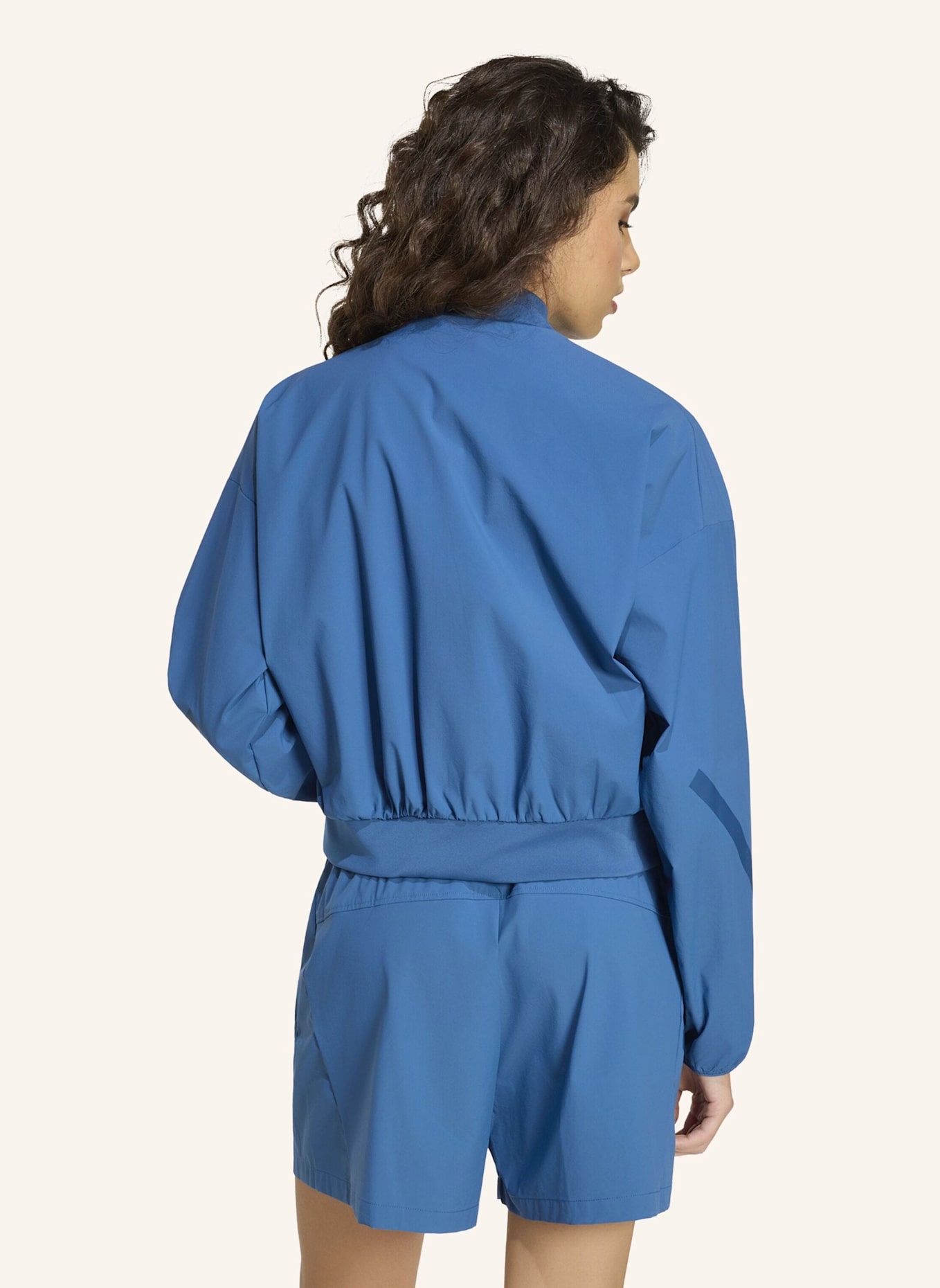 adidas ADIDAS Z.N.E. WOVEN BOMBERJACKE: BLAU