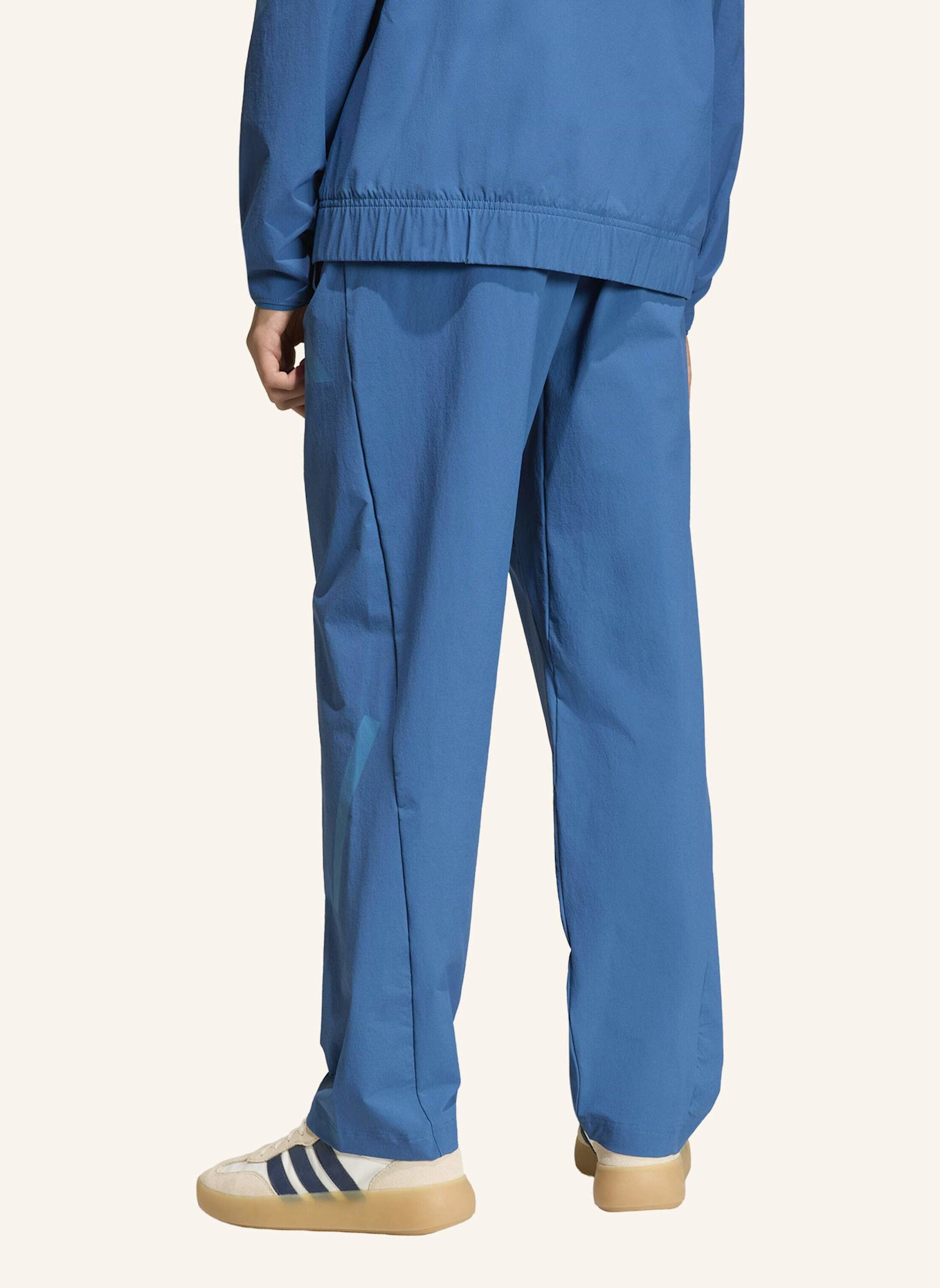 adidas ADIDAS Z.N.E. WOVEN TRAVEL HOSE: BLAU