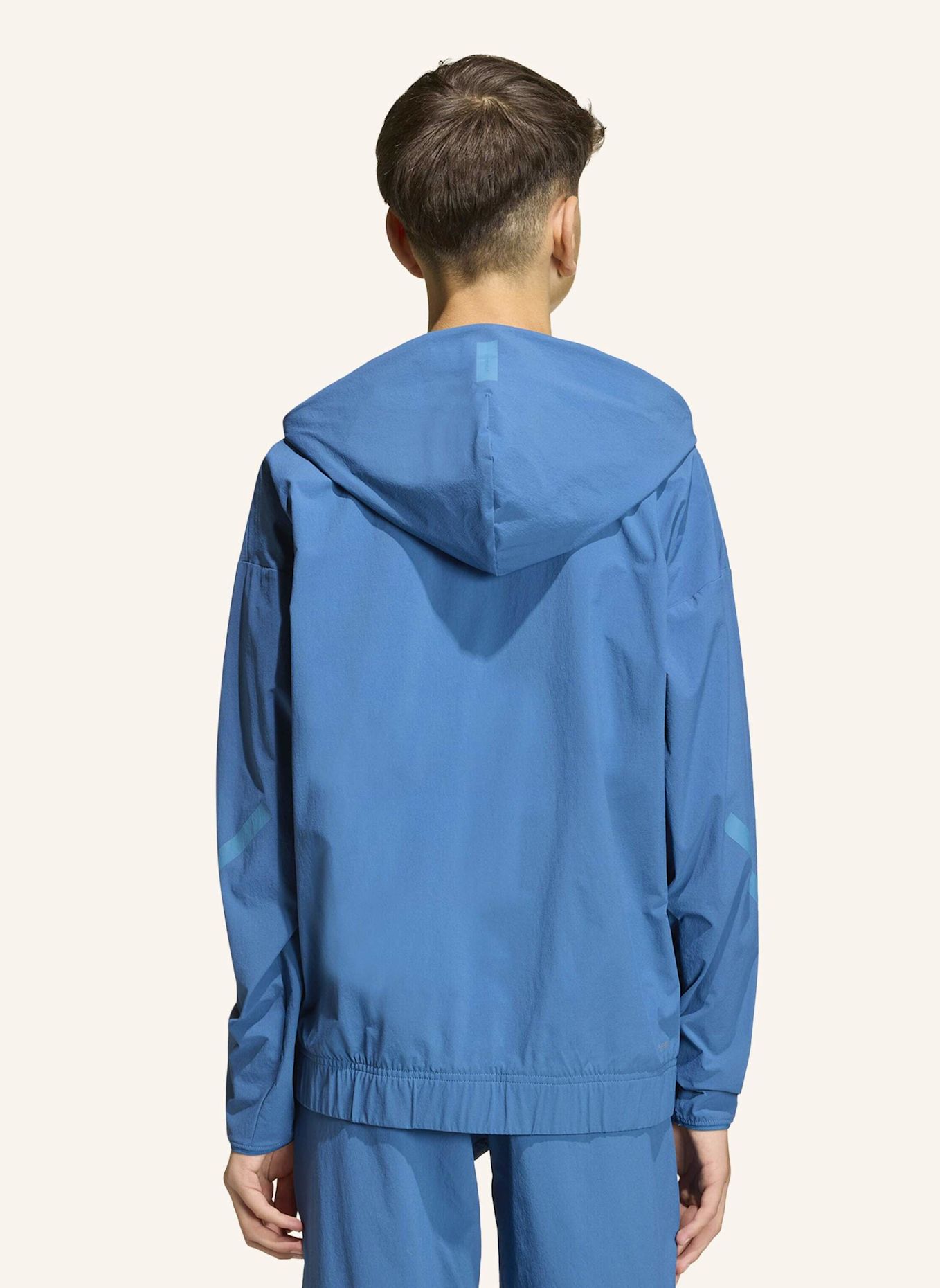 adidas ADIDAS Z.N.E. GEWEBTE TRAVEL COVER UP TRAININGSJACKE: BLAU