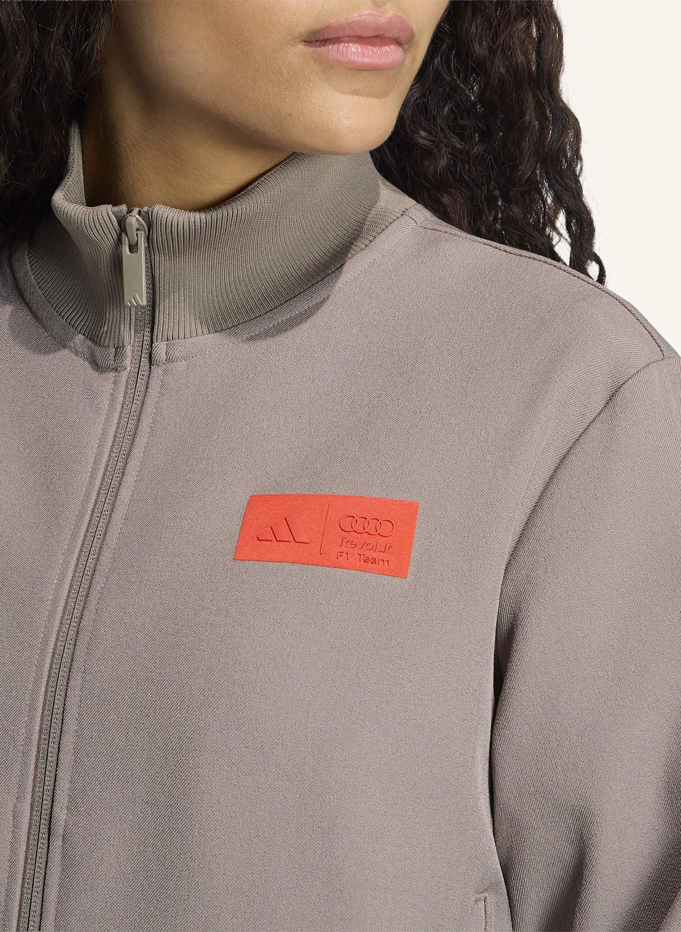 adidas AUDI REVOLUT F1 TEAM ELEVATED TRAININGSJACKE: BRAUN/ ROT