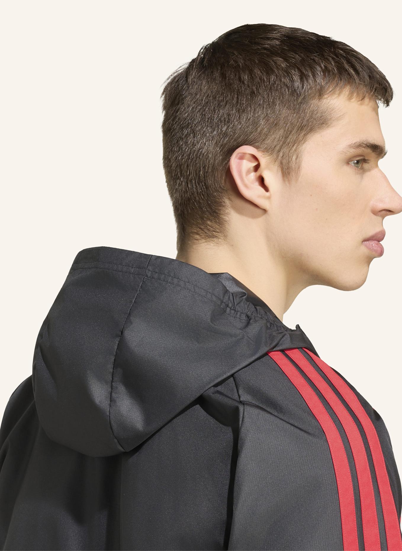 adidas MANCHESTER UNITED 26/27 TIRO ALLWETTER-JACKE: SCHWARZ