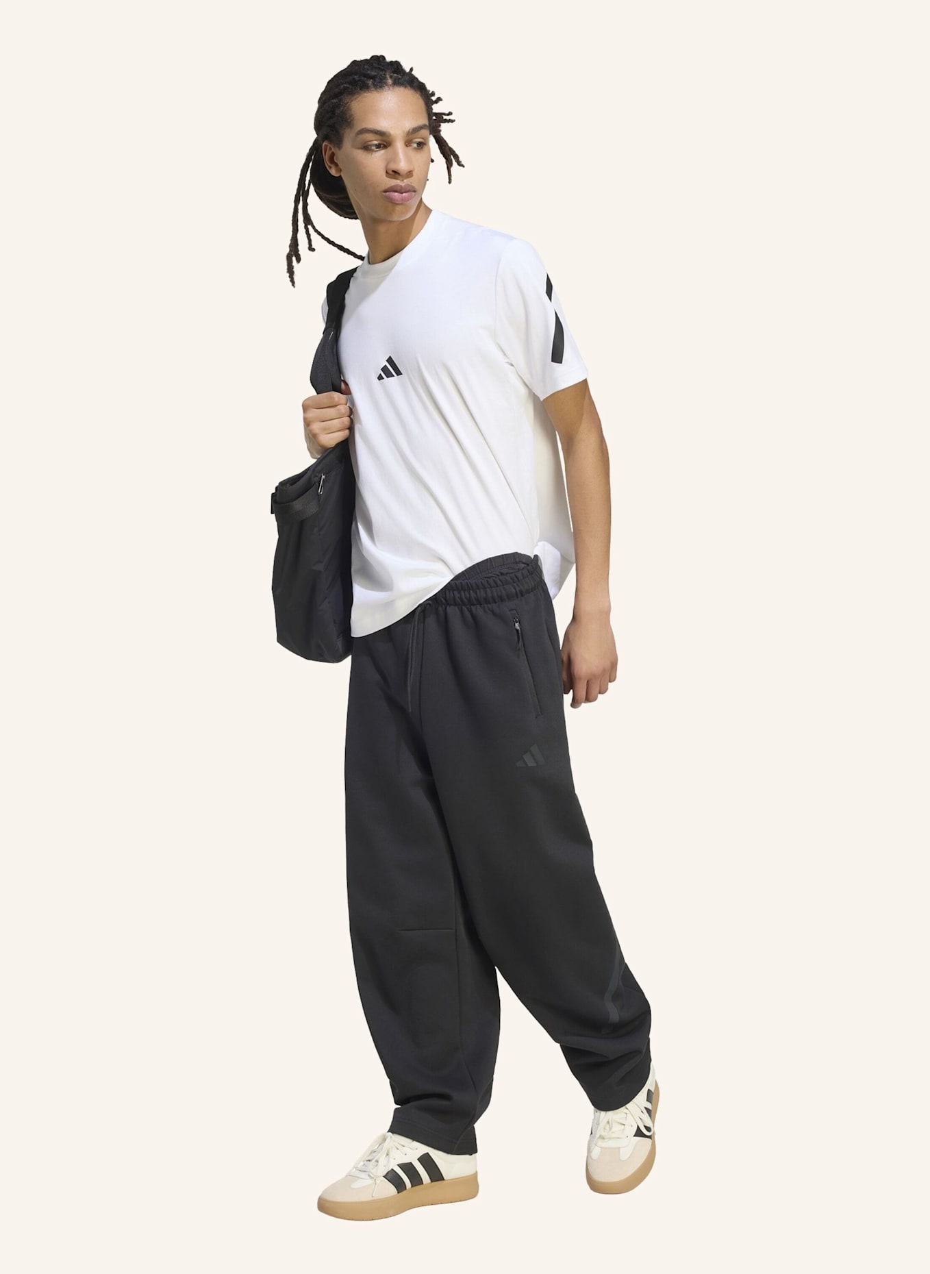 adidas ADIDAS Z.N.E. HOSE OFFENER SAUM: SCHWARZ