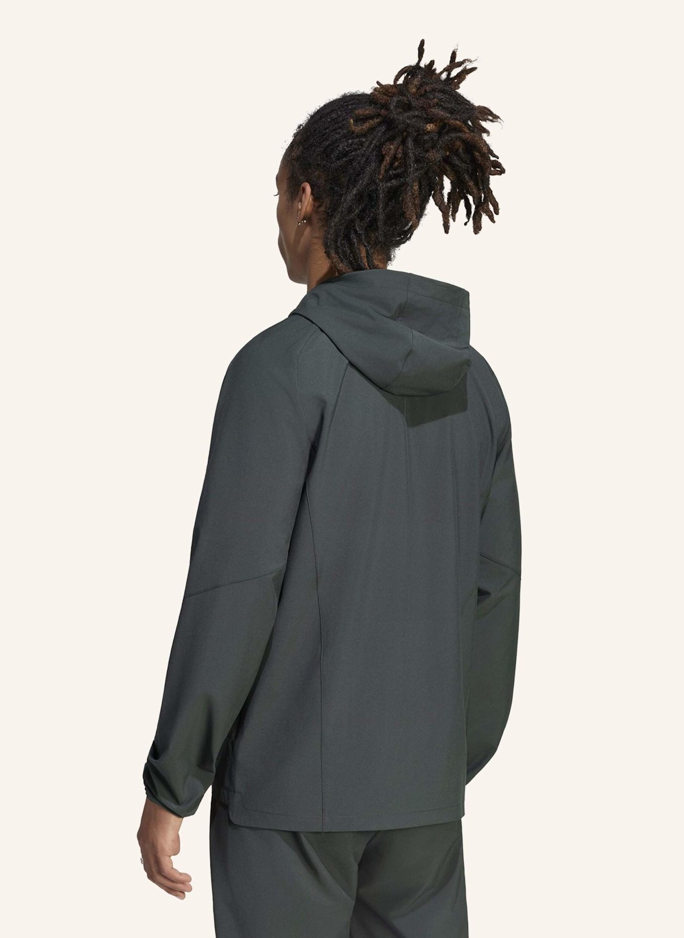 adidas MACHCHESTER UNITED TIRO TRAVEL WINDBREAKER, DURCHGEHENDER REISSVERSCHLUSS: GRÜN