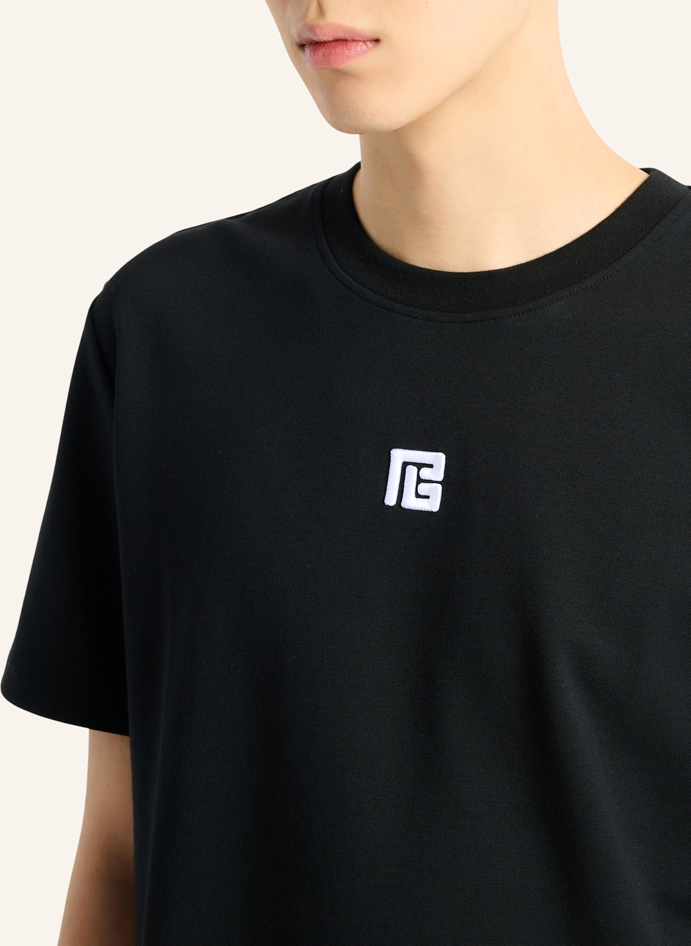 BALMAIN T-Shirt mit aufgesticktem Logo: SCHWARZ