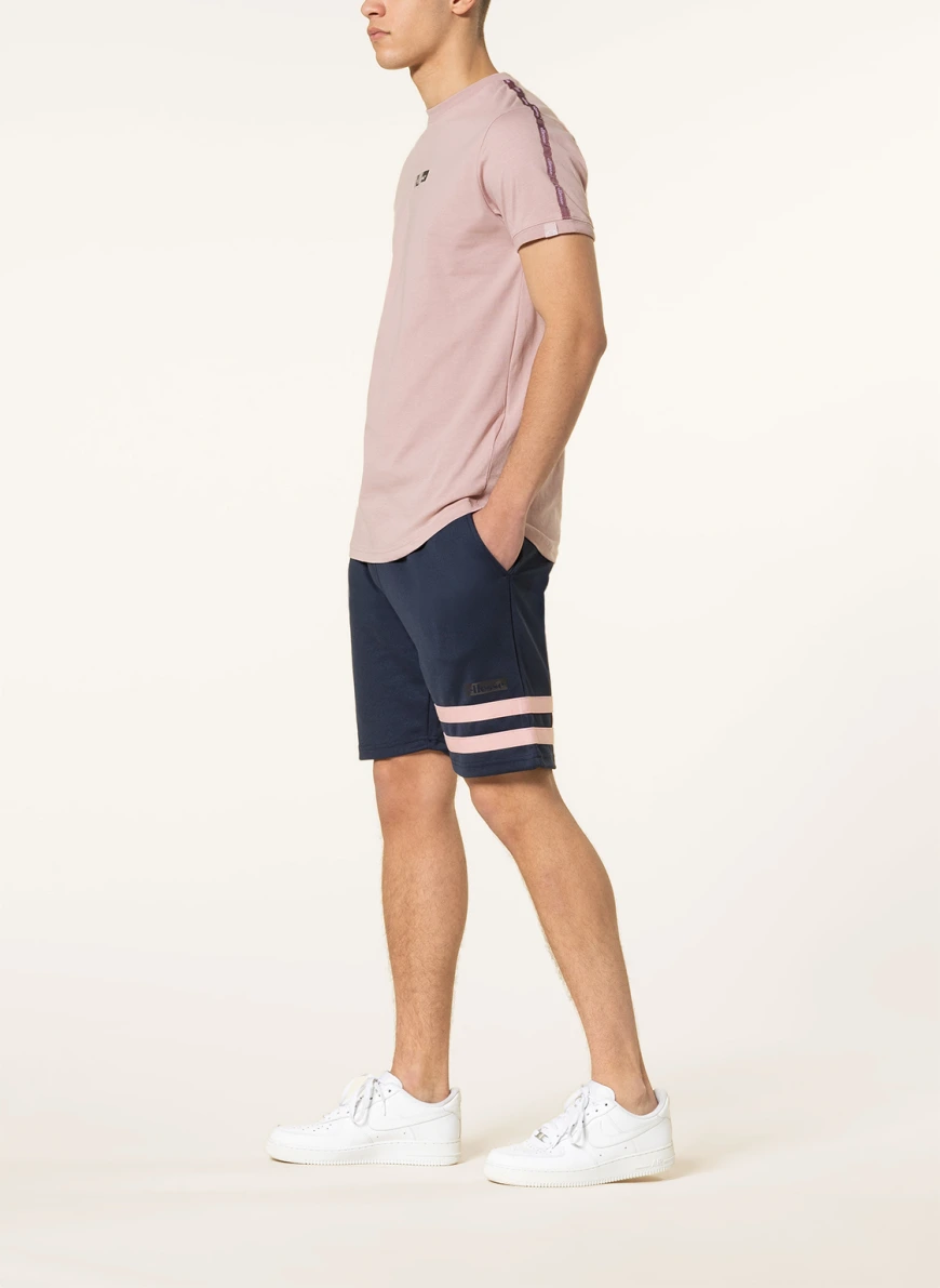 ellesse Sweatshorts in dunkelblau/ rosa NF6828
