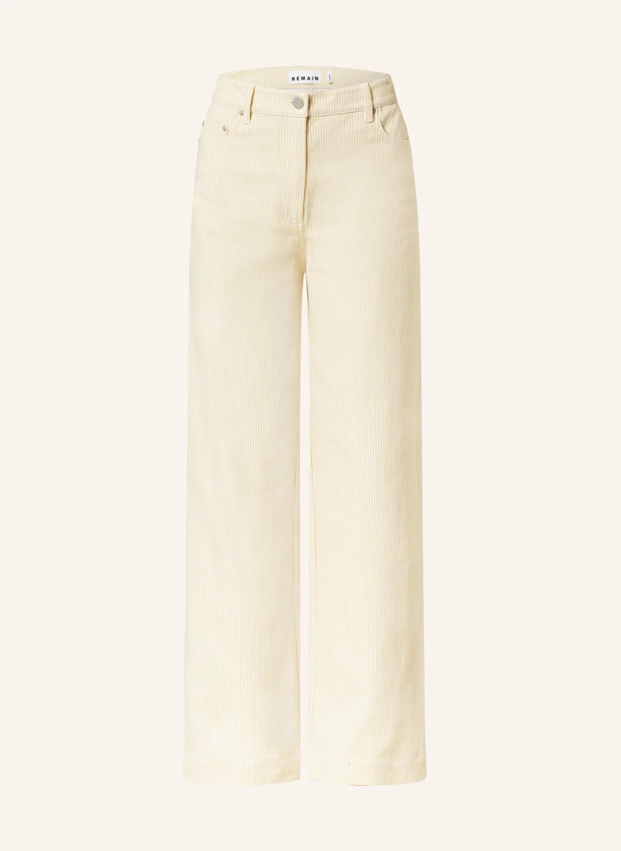 REMAIN Wide leg trousers YELLOW / WHITE