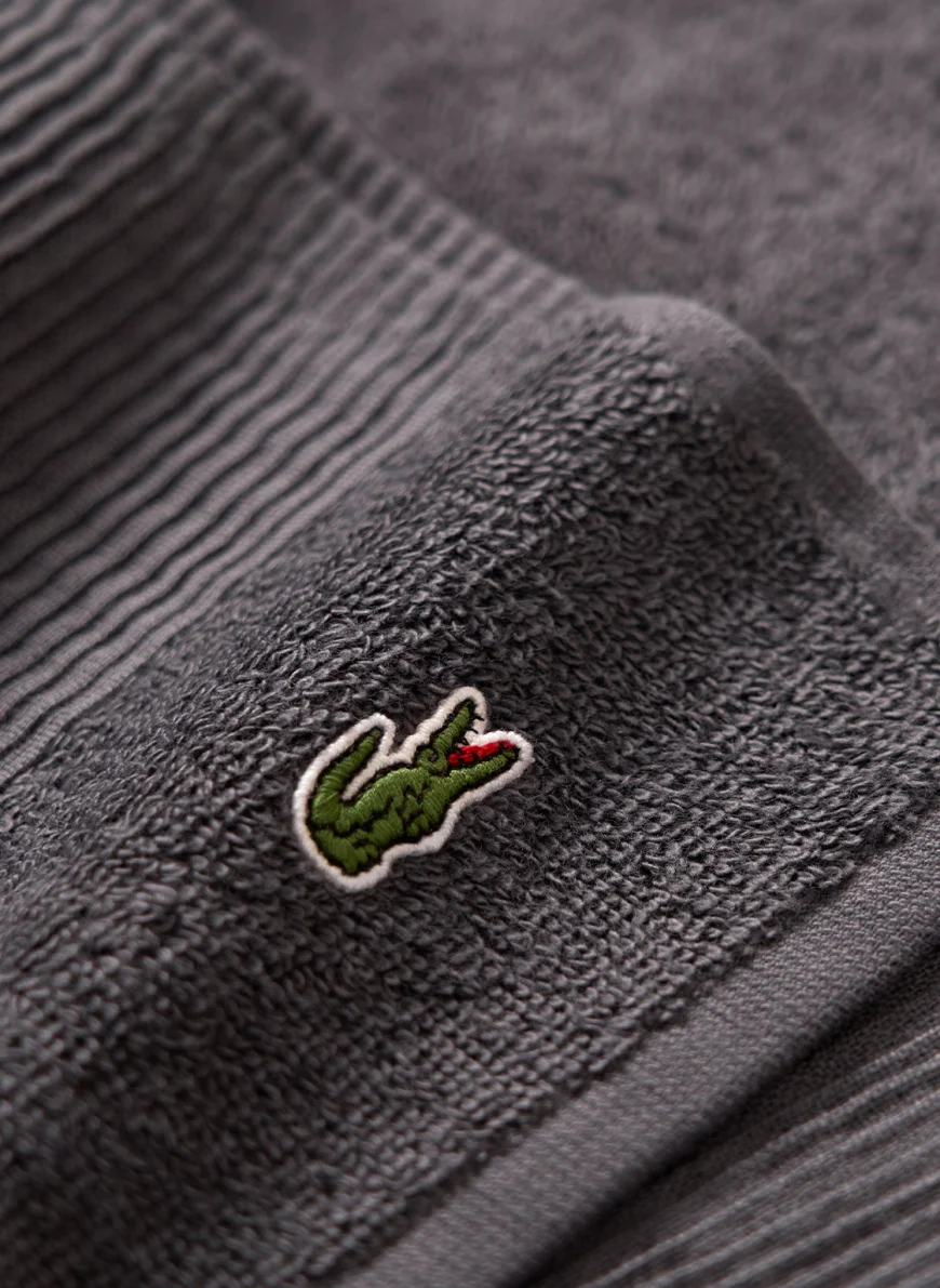 LACOSTE Duschtuch in grau